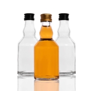 Butelka Elixir 50 ml – dwie małe butelki z zakrętkami na białym tle
