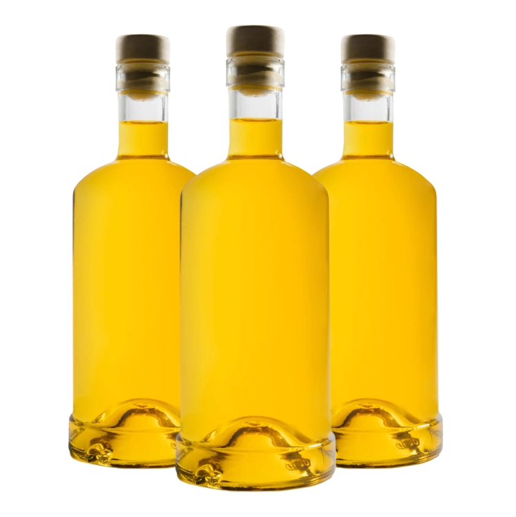 Zestaw 5 butelek Statua 500 ml z korkami – zdjęcie kilku butelek z bursztynowym płynem